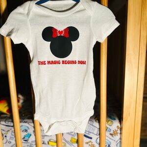 Magic begins now baby onesie